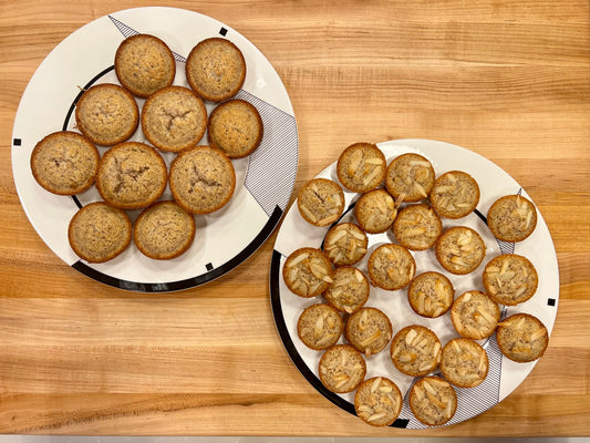 Two plates of Almond Financiers showing the regular and mini sizes.